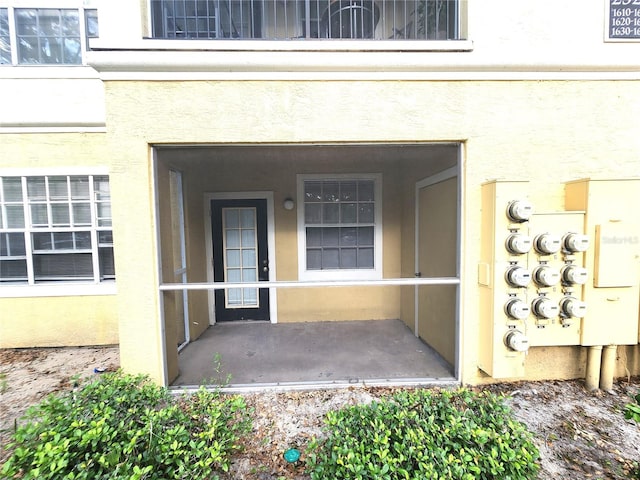 2528 Robert Trent Jones Dr Unit 1617, Orlando, FL 32835 - doorway to property featuring stucco siding