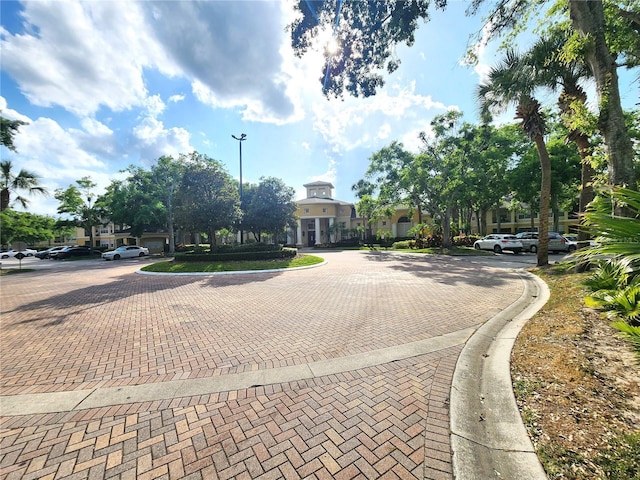 2528 Robert Trent Jones Dr Unit 1617, Orlando, FL 32835 - view of street featuring curbs and street lights