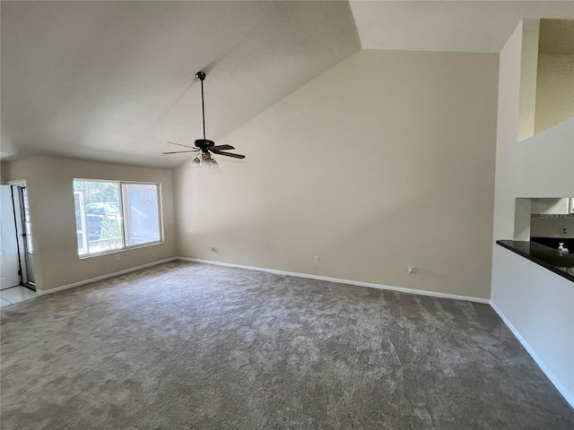 unfurnished living room featuring carpet flooring, ceiling fan, and lofted ceiling
