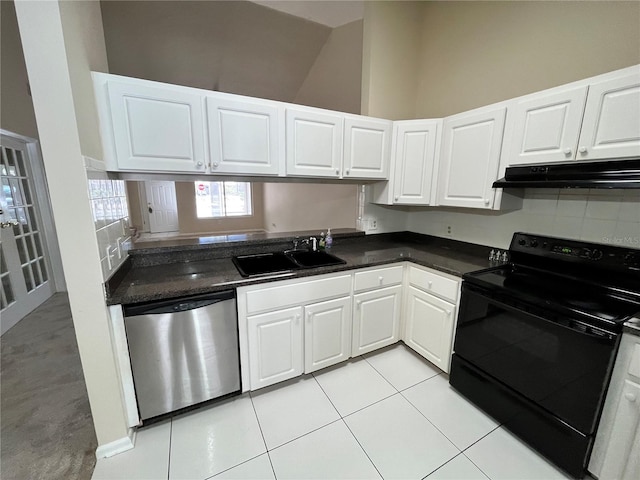 kitchen with dark countertops, black electric range oven, stainless steel dishwasher, a sink, and under cabinet range hood