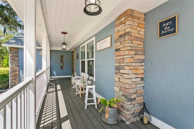 6330 Oil Well Rd, Clermont, FL 34714 - wooden terrace featuring covered porch