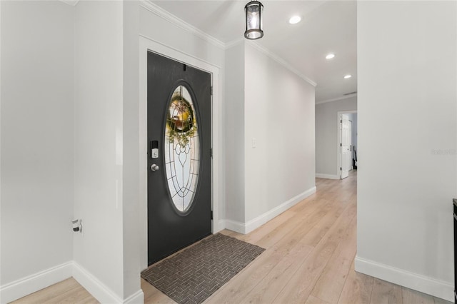 6330 Oil Well Rd, Clermont, FL 34714 - foyer entrance featuring crown molding, recessed lighting, baseboards, and light wood-style floors