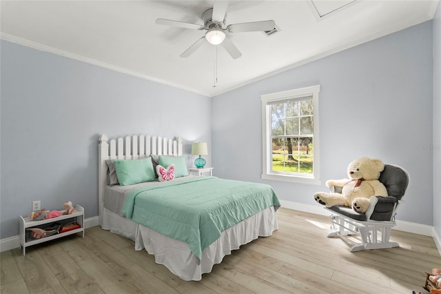 6330 Oil Well Rd, Clermont, FL 34714 - bedroom with light wood-style flooring, baseboards, and ornamental molding