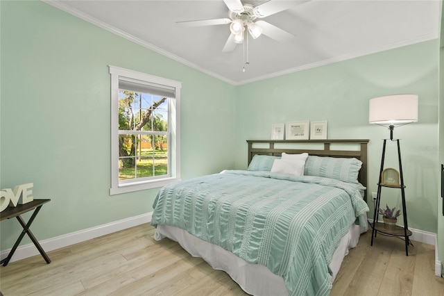 6330 Oil Well Rd, Clermont, FL 34714 - bedroom with crown molding, wood finished floors, ceiling fan, and baseboards