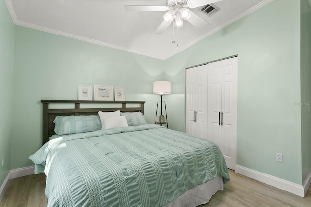 6330 Oil Well Rd, Clermont, FL 34714 - bedroom featuring light wood-style floors, visible vents, and baseboards