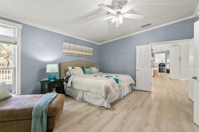 6330 Oil Well Rd, Clermont, FL 34714 - bedroom featuring crown molding, visible vents, ceiling fan, and light wood-style floors