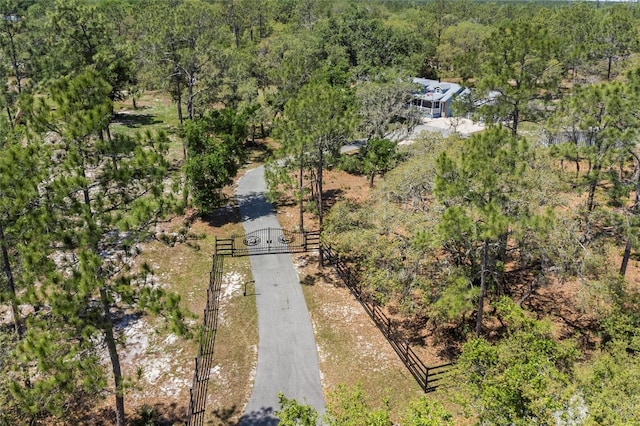 6330 Oil Well Rd, Clermont, FL 34714 - bird's eye view featuring a wooded view