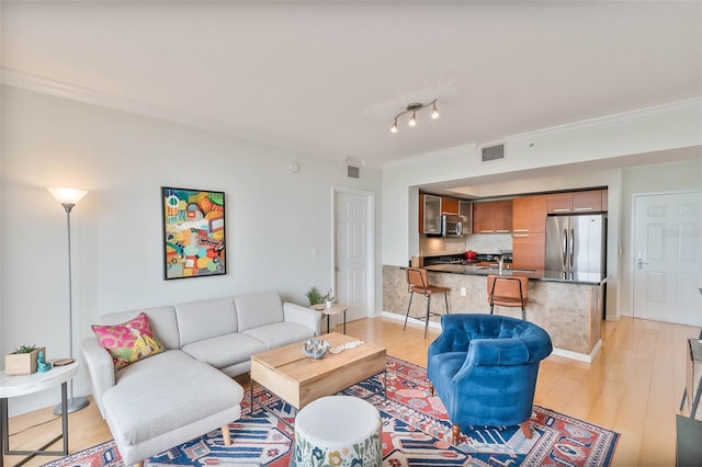 2030 S Douglas Rd Unit 718, Coral Gables, FL 33134 - living room with ornamental molding and light wood finished floors