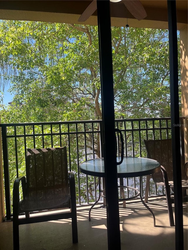 12527 Floridays Resort Dr Unit 311E, Orlando, FL 32821 - balcony featuring outdoor dining area