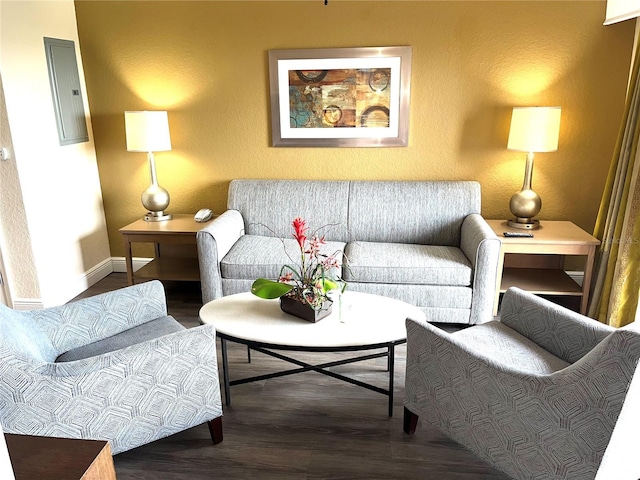 12527 Floridays Resort Dr Unit 311E, Orlando, FL 32821 - living room with a textured wall, baseboards, and wood finished floors