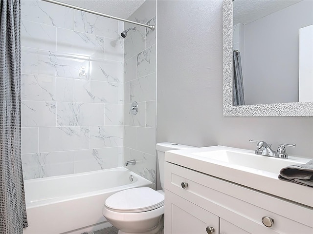 bathroom featuring shower / tub combo, vanity, and toilet