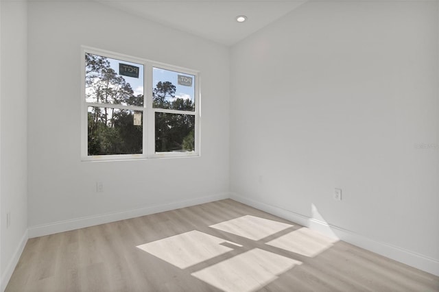 2551 Alhaven Ter, North Port, FL 34286 - empty room with baseboards, recessed lighting, and wood finished floors