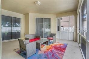 5005 Cape Hatteras Dr, Clermont, FL 34714 - view of sunroom / solarium