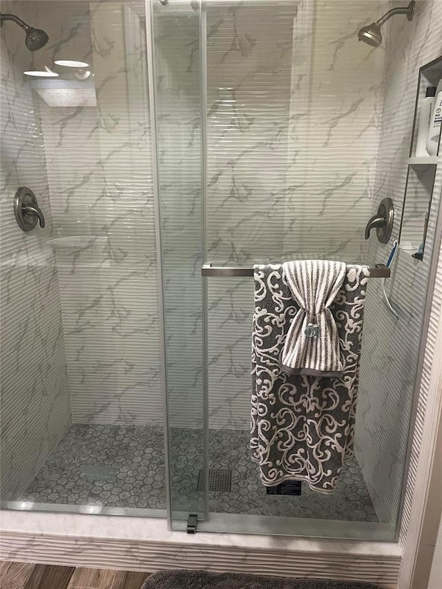 bathroom featuring a shower stall