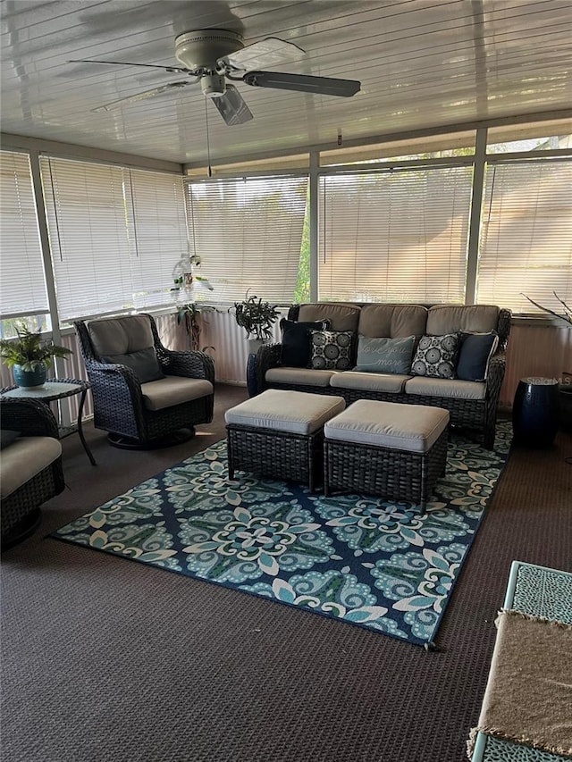 sunroom / solarium with ceiling fan, plenty of natural light, and an outdoor hangout area