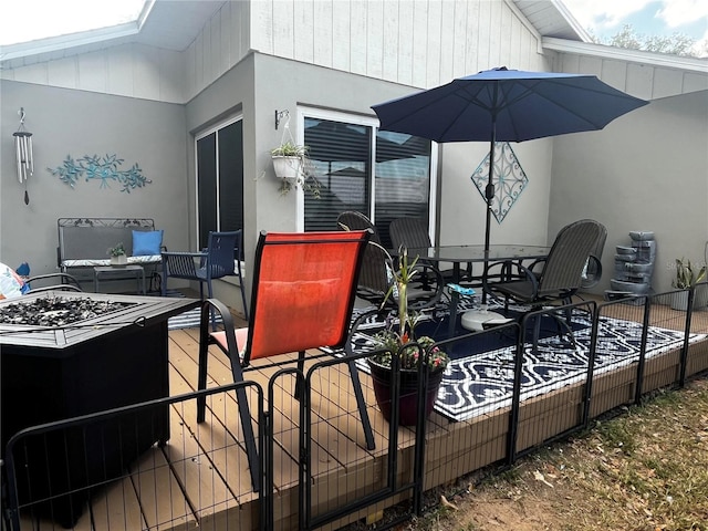 deck featuring outdoor dining space