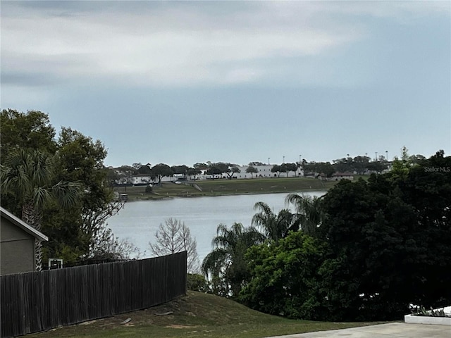 view of water feature with fence