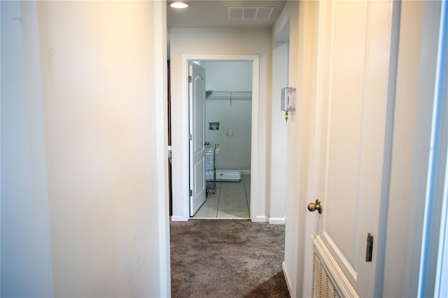 184 Lake Smart Cir, Winter Haven, FL 33881 - corridor with carpet floors and baseboards