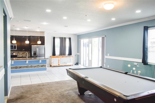 184 Lake Smart Cir, Winter Haven, FL 33881 - playroom with recessed lighting, a sink, light carpet, light tile patterned floors, and crown molding