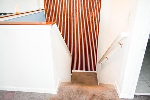 184 Lake Smart Cir, Winter Haven, FL 33881 - stairs with carpet and baseboards