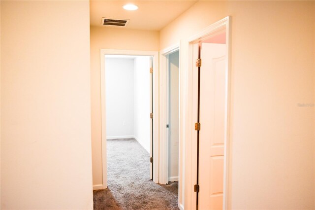 184 Lake Smart Cir, Winter Haven, FL 33881 - corridor featuring carpet, recessed lighting, and baseboards