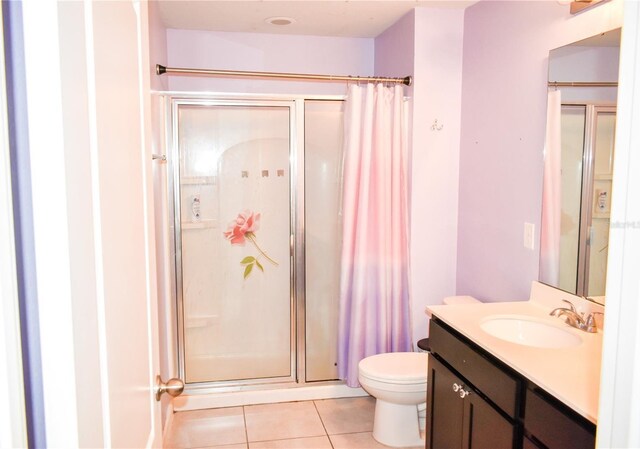 184 Lake Smart Cir, Winter Haven, FL 33881 - full bathroom featuring tile patterned floors, a shower with curtain, toilet, and vanity
