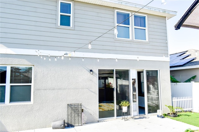 184 Lake Smart Cir, Winter Haven, FL 33881 - back of property featuring a patio and fence