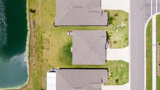 drone / aerial view with a water view
