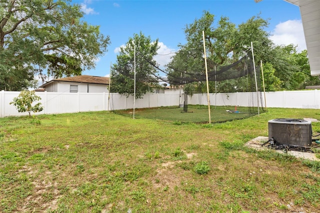 view of yard with a fenced backyard and cooling unit