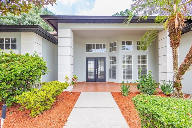 8023 Canyon Lake Cir, Orlando, FL 32835 - property entrance with french doors and stucco siding