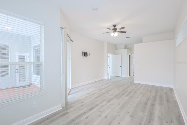 8023 Canyon Lake Cir, Orlando, FL 32835 - unfurnished room with ceiling fan, light wood-style flooring, baseboards, and a smoke detector
