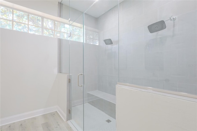 8023 Canyon Lake Cir, Orlando, FL 32835 - full bathroom with a shower stall, plenty of natural light, wood finished floors, and baseboards