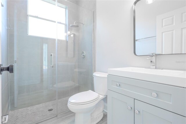 8023 Canyon Lake Cir, Orlando, FL 32835 - full bathroom with toilet, a stall shower, and vanity