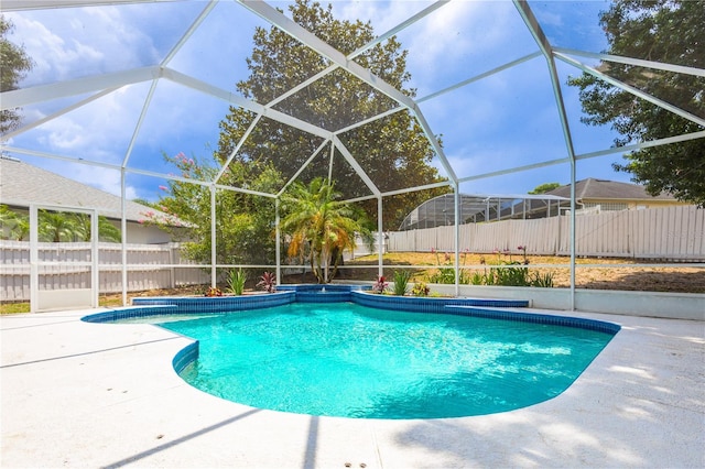 8023 Canyon Lake Cir, Orlando, FL 32835 - view of pool featuring fence, a patio, and glass enclosure