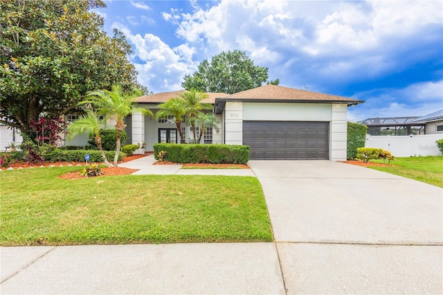 8023 Canyon Lake Cir, Orlando, FL 32835 - ranch-style house with concrete driveway, a garage, stucco siding, and roof with shingles