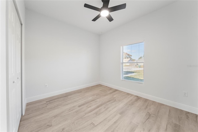 2668 Dennis Ave SE, Palm Bay, FL 32909 - spare room featuring light wood-style flooring, baseboards, and a ceiling fan
