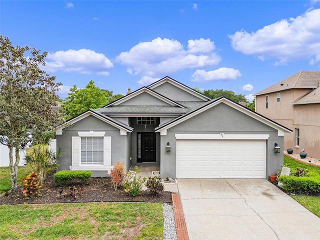 ranch-style house featuring a garage, stucco siding, and concrete driveway