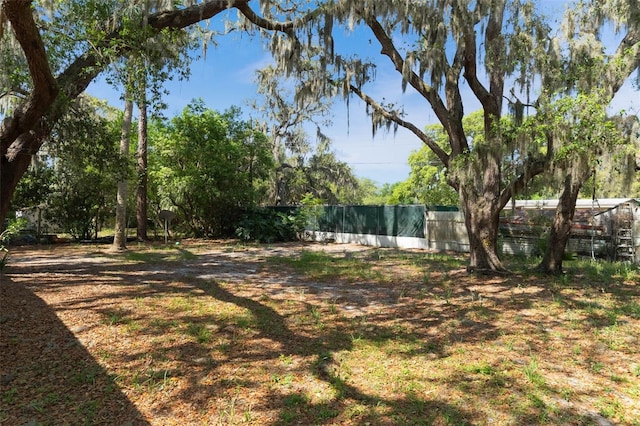view of yard with fence