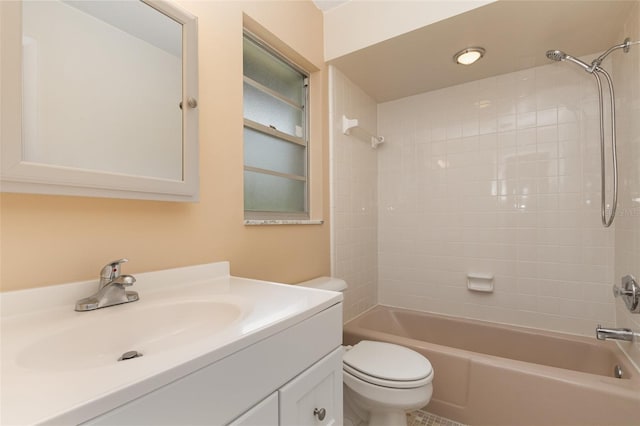 full bathroom featuring shower / bath combination, vanity, and toilet