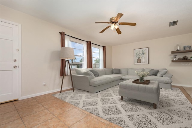 1432 Meadowlark Dr, Deltona, FL 32725 - tiled living room with ceiling fan and baseboards