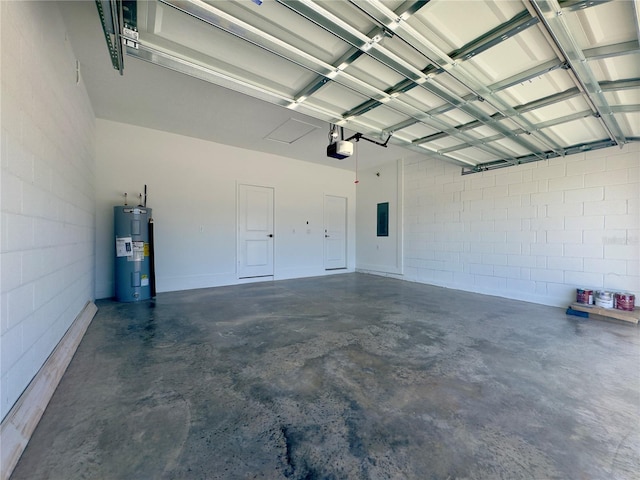 garage with water heater, a garage door opener, concrete block wall, and electric panel