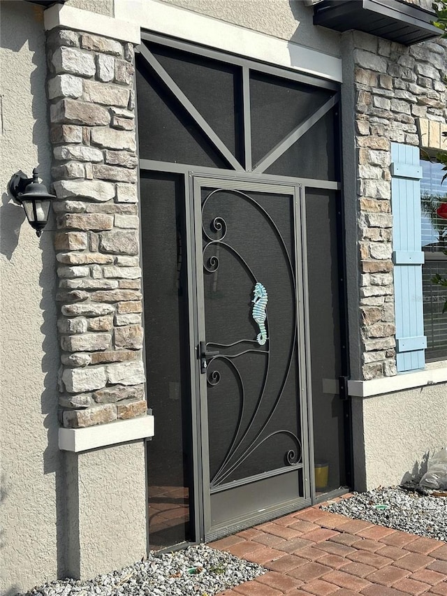 2137 Apian Way, Port Charlotte, FL 33953 - entrance to property featuring stone siding and stucco siding
