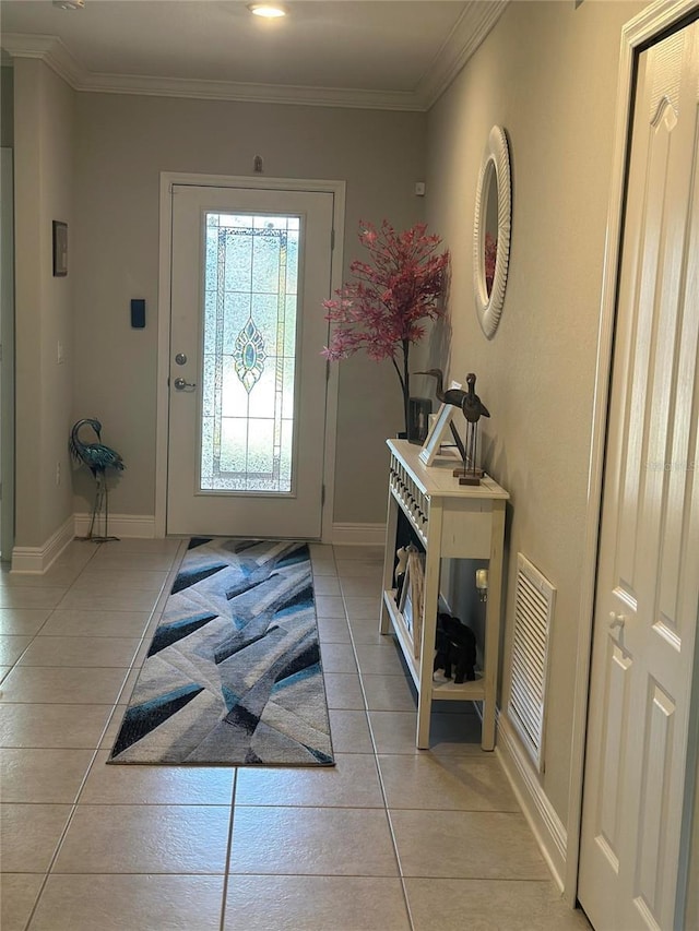 2137 Apian Way, Port Charlotte, FL 33953 - foyer entrance with light tile patterned floors, crown molding, and baseboards
