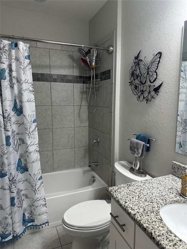 2137 Apian Way, Port Charlotte, FL 33953 - full bathroom featuring toilet, shower / bath combo, tile patterned flooring, vanity, and a textured wall