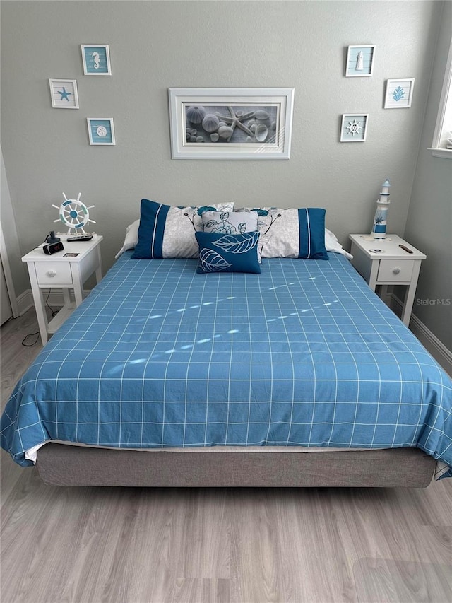 2137 Apian Way, Port Charlotte, FL 33953 - bedroom featuring wood finished floors and baseboards