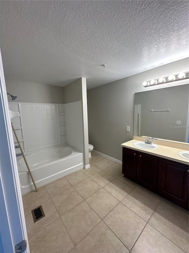 2125 Betsy Ross Ln, Saint Cloud, FL 34769 - full bathroom featuring a sink, tile patterned floors, double vanity, and toilet