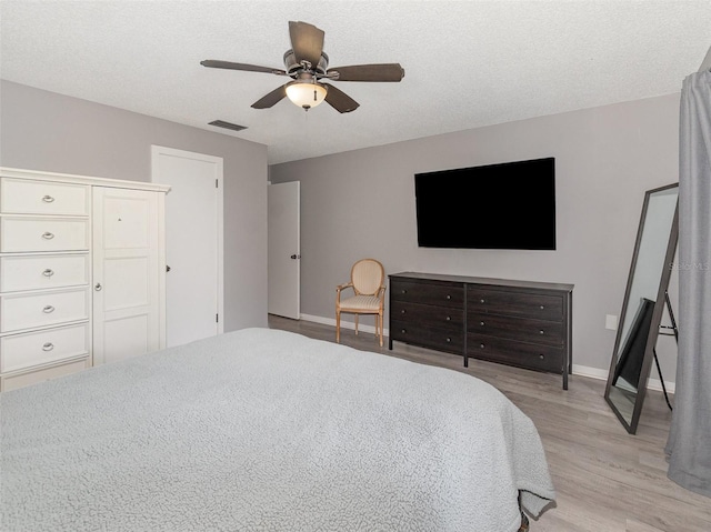 490 Burnt Tree Ln, Apopka, FL 32712 - bedroom featuring a ceiling fan, baseboards, visible vents, and light wood-style floors