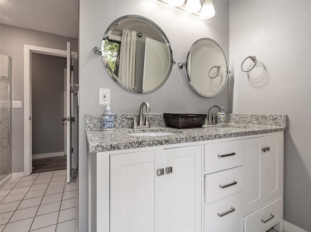 490 Burnt Tree Ln, Apopka, FL 32712 - full bath featuring a sink, tile patterned floors, baseboards, and double vanity