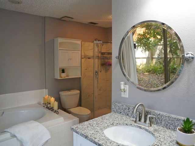 490 Burnt Tree Ln, Apopka, FL 32712 - full bath with a garden tub, a textured ceiling, a shower stall, vanity, and toilet