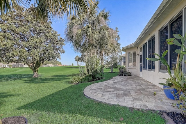 1900 NW 57th Ct, Ocala, FL 34482 - view of grassy yard with a patio area